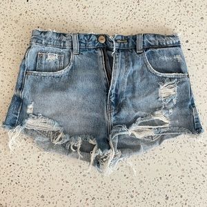 Distressed denim shorts